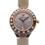 Swarovski - Lady's copper-colour stainless steel quartz fashion watch