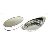 Oval silver dressing table box and oval pierced dish