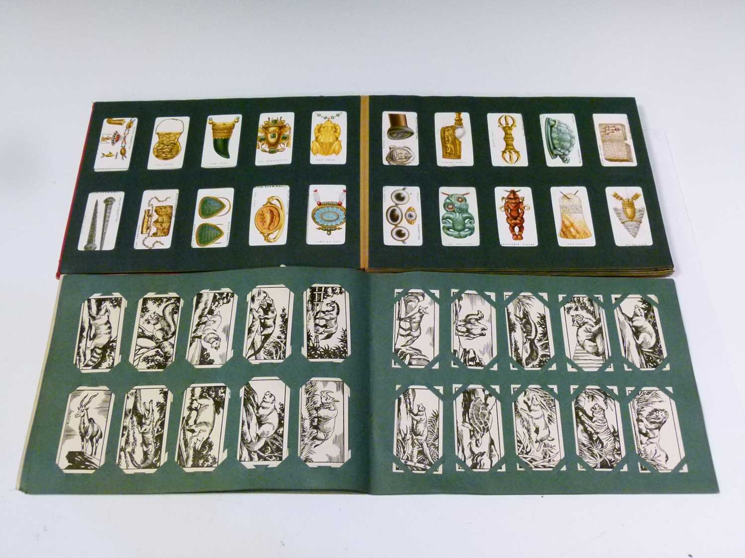 Two albums of cigarette cards