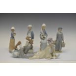 Lladro clown, three Lladro figures, etc.