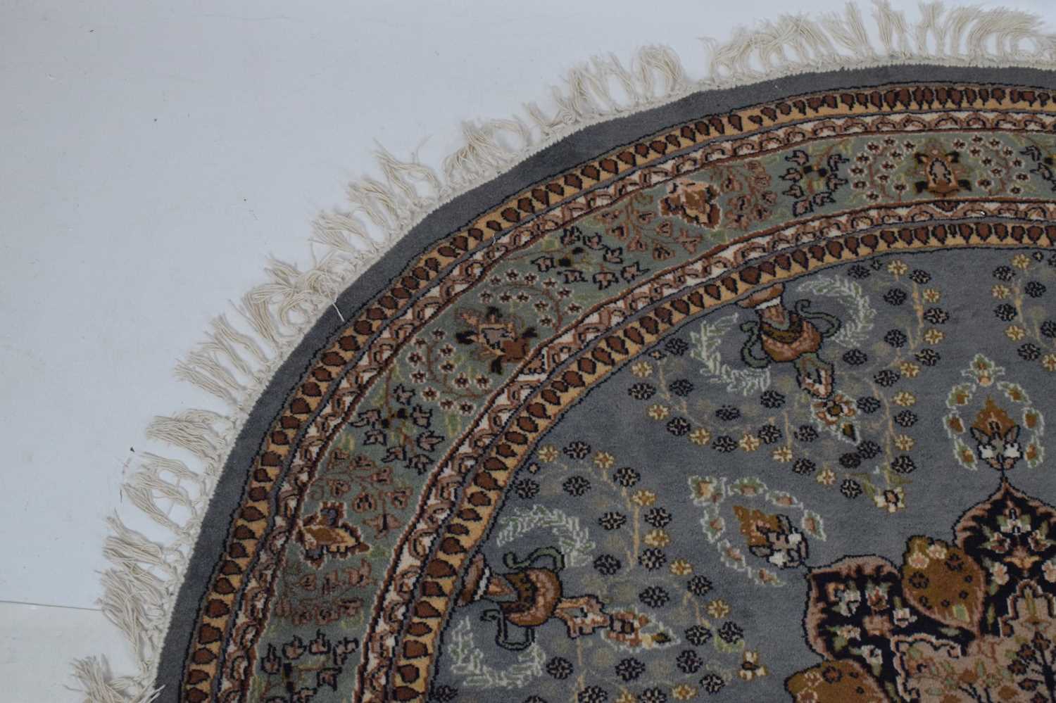 Circular blue ground wool rug with central medallion - Image 3 of 7