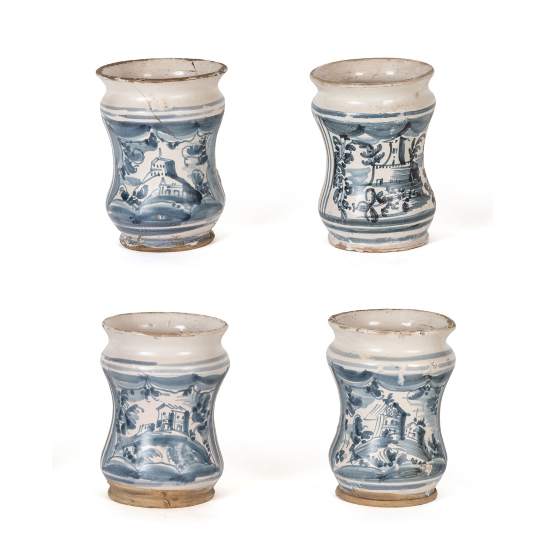 Group of four white and blue majolica albarelli