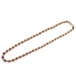 18kt yellow gold and rubies necklace