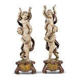 Pair of lacquered and gilt wood sculptures