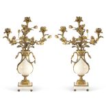 Pair of gilded bronze and white marble candelabra