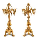 Pair of gilded and chiseled bronze candelabra