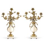 Pair of gilded bronze and white marble candelabra