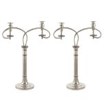 Pair of silvered metal candlesticks