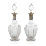 Pair of cut crystal and silver bottles