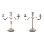 Pair of silver candelabra