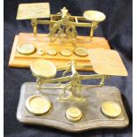 POSTAL SCALES 20thC (early) two brass postal scales with platforms engraved with postal rates, one