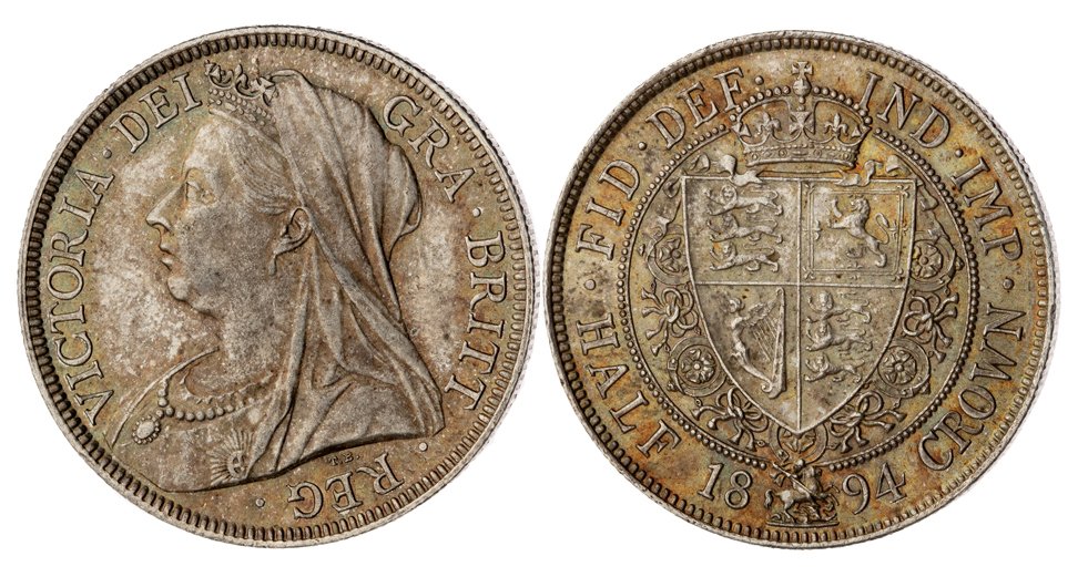 1894 halfcrown, UNC with lovely colourful tone over quite reflective fields. The scarcest date of