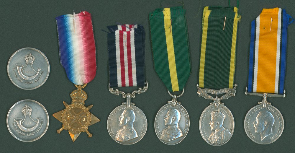 Group of five plus two medallions, Military Medal Geo V to 265341 Pte. T. W. Stobbart, 6th East Kent