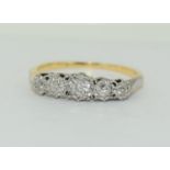 Diamond five stone set in high carat gold ring. Size O.