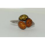 A 925 silver and amber ring, size Q 1/2.