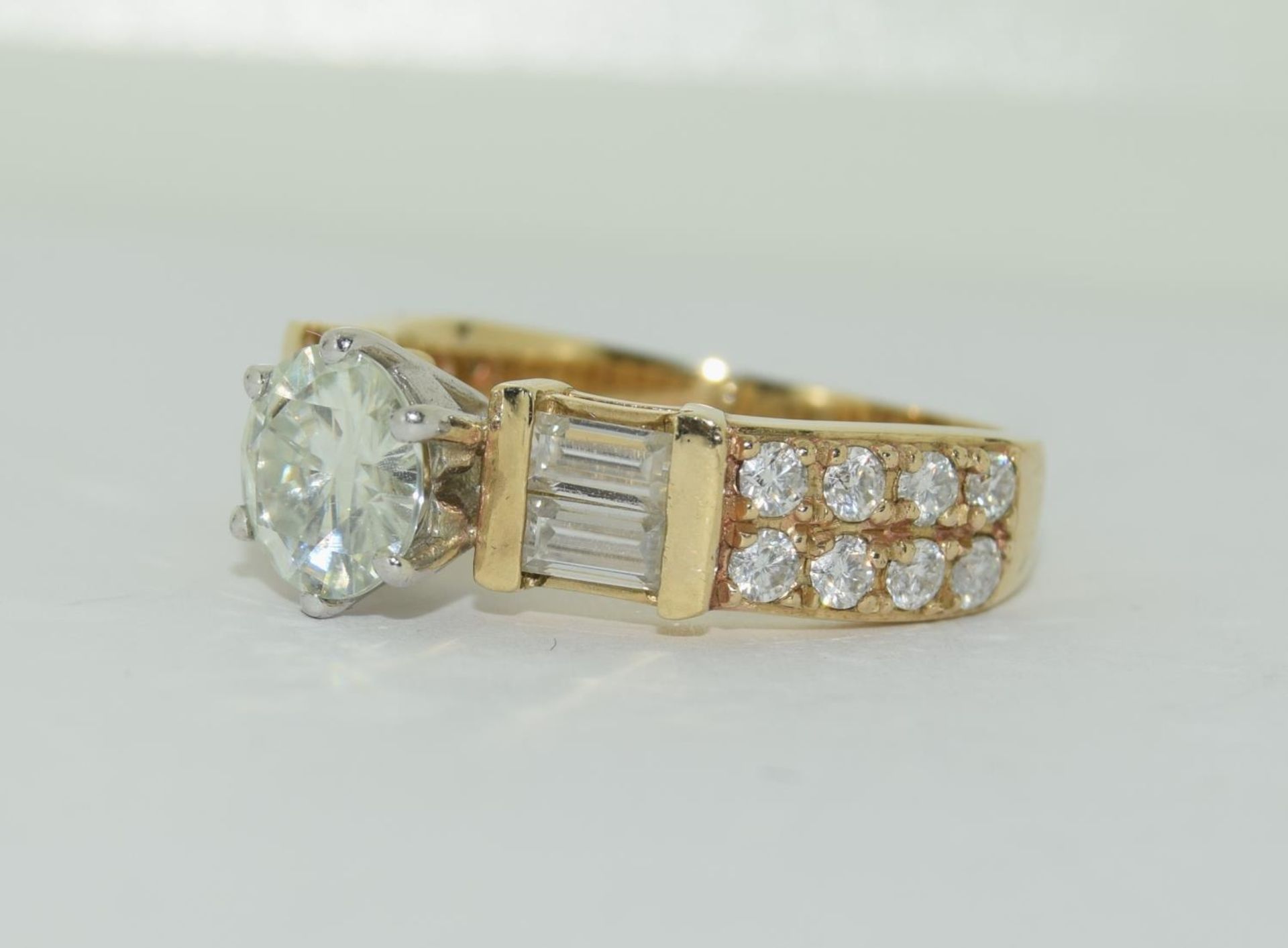 9ct gold Moissanite Diamond ring - 1.00ct centre stone, baguette/round stones on sides. Size M+. - Image 4 of 5