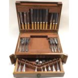 Extensive canteen of cutlery by William Bocking. Hinged box with drawer under.