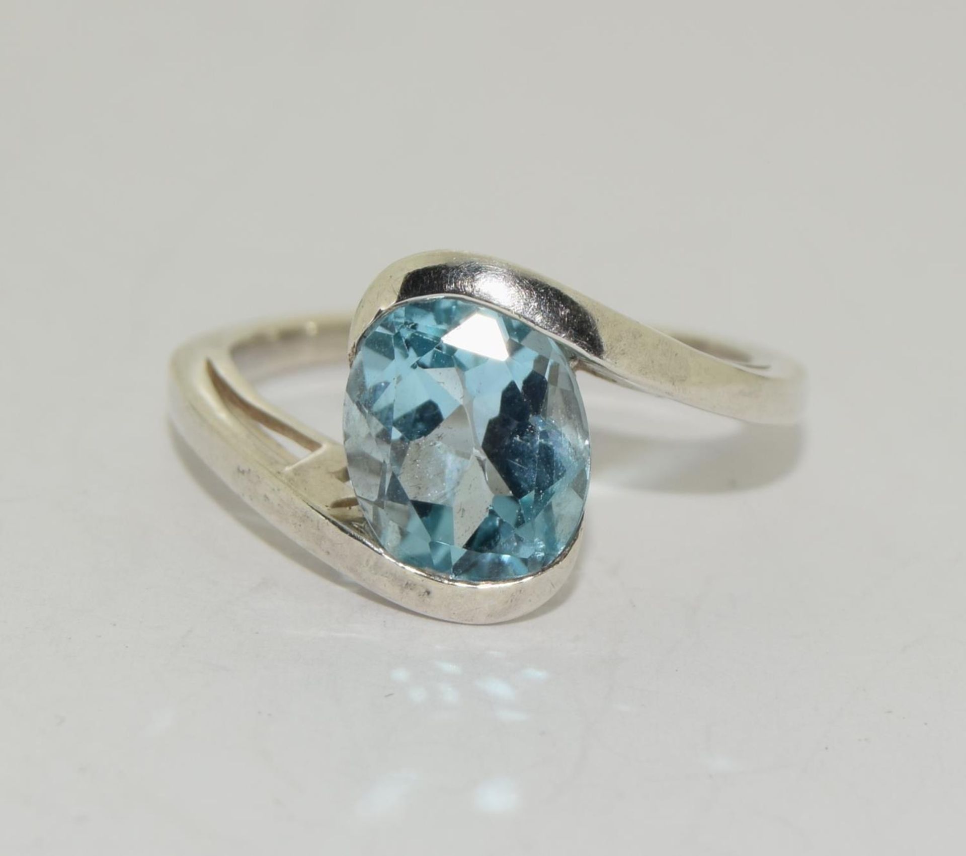 Lovely ice blue topaz 925 silver solitaire ring. Size P 1/2.