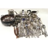 A large collection of assorted silver plate to include cutlery.