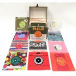 Vintage carry case of mainly 60s and 70s 7" vinyl singles to include David Bowie, Adam Faith,