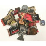 Superb collection of WW2 Nazi fundraising propaganda booklets and tokens/badges. Many still