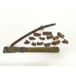 Collection of Japanese items to include a miniature sword and a brass letter opener