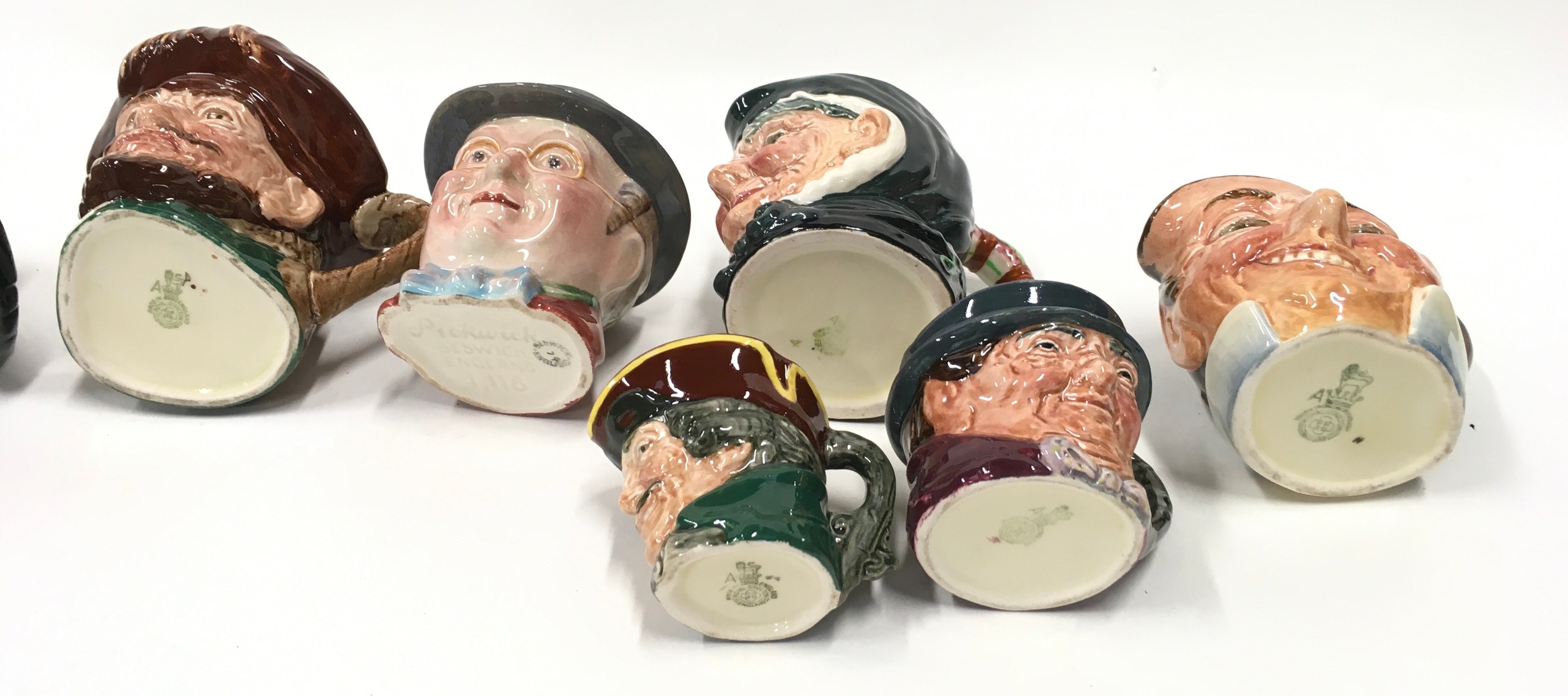 Eleven toby character jugs with examples by Royal Doulton and Beswick. - Image 4 of 5