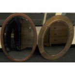 Copper framed Arts and Crafts oval mirror o/all 30" across with another vintage mahogany framed oval