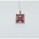 Large pink emerald cut CZ 925 silver pendant.