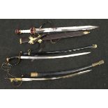 Three naval swords with scabbards.