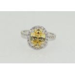 Lemon gem CZ white gold on silver halo ring. Size N1/2.