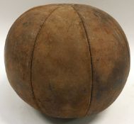 Vintage leather medicine ball. Good condition with stitching intact