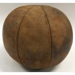 Vintage leather medicine ball. Good condition with stitching intact