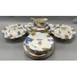 Alfrerd Meakin dinner service in Harmony pattern. 6 settings plus lidded tureens and serving