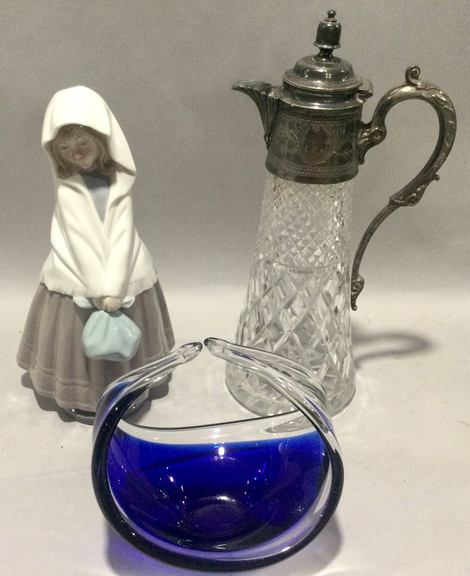 Nao figurine of a girl 26cm tall together with a blue glassware sweet bowl and crystal glass