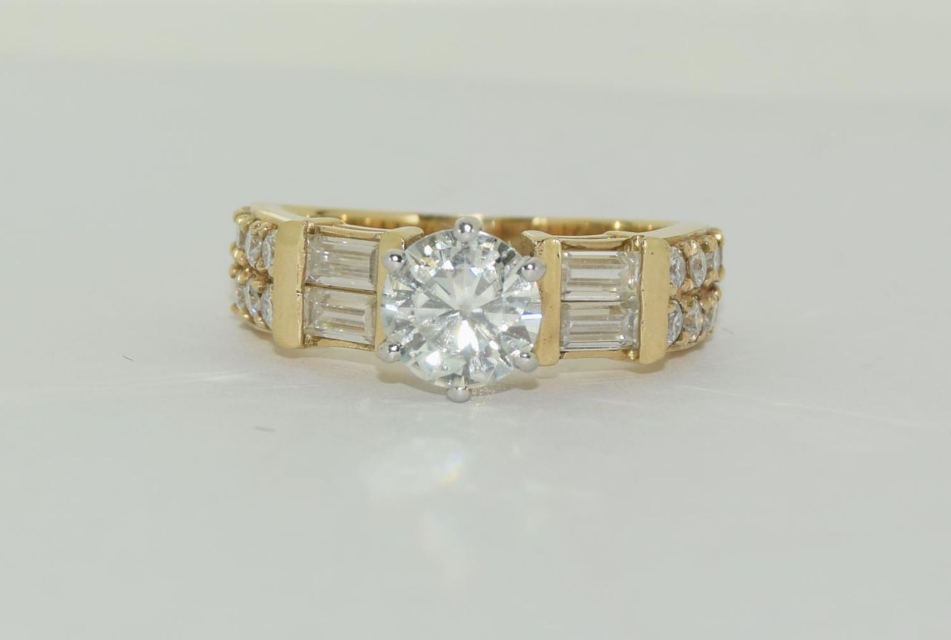 9ct gold Moissanite Diamond ring - 1.00ct centre stone, baguette/round stones on sides. Size M+.
