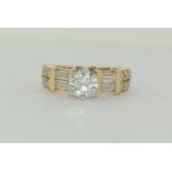 9ct gold Moissanite Diamond ring - 1.00ct centre stone, baguette/round stones on sides. Size M+.