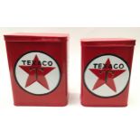A pair of Texaco cans.