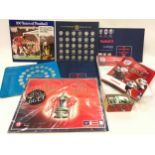 Collection of completed ESSO and other football collectors tokens folders together with a pair of