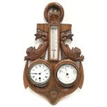 20th Century oak carved clock/barometer/thermometer in the form of an anchor flanked by coiled