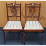 Pair of Edwardian boxwood inlaid bedroom chairs.
