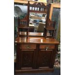 Edwardian mahogany mirror back chiffonier having two draws over two cupboards