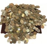 Tub containing a large quantity of vintage coins from mid Victorian onwards. Mainly UK but also