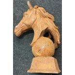 A horse head on ball. Ref 203