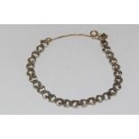 Victorian old cut diamond bracelet set in silver and gold backed. has had a gold chain added.