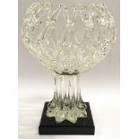 Toulet va Bael large clear glass centrepiece. Latticework bowl set on an ebonised wooden plinth.