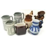 Seven large jugs to include Wedgwood.