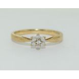 9ct gold ladies diamond daisy ring H/M 0.10ct size O