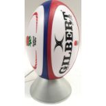 Table lamp in the form of a Gilbert England Rugby ball