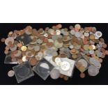 A clear tub of various coinage.